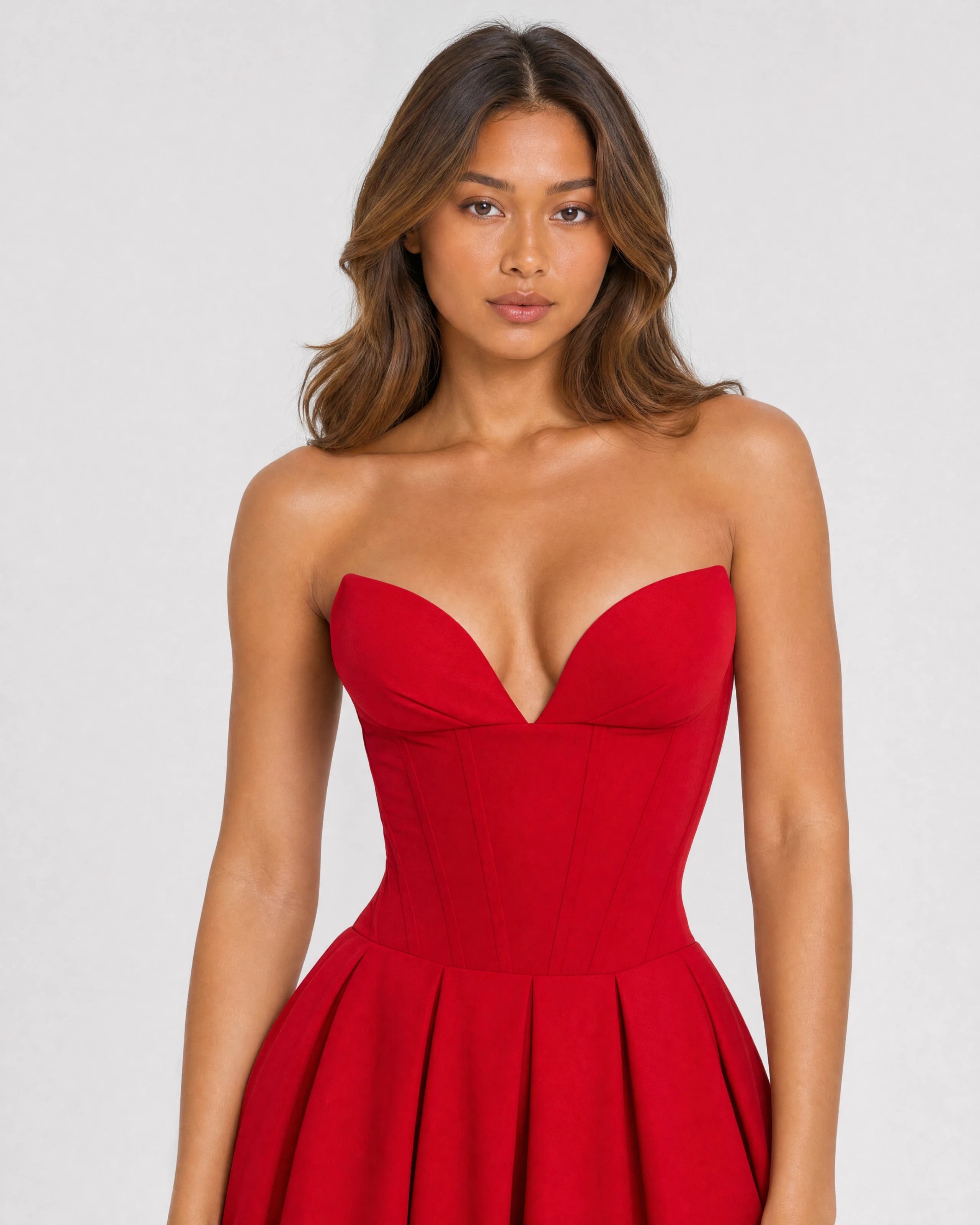 Adeline red corset midi dress with full pleated skirt - waist-up close-up