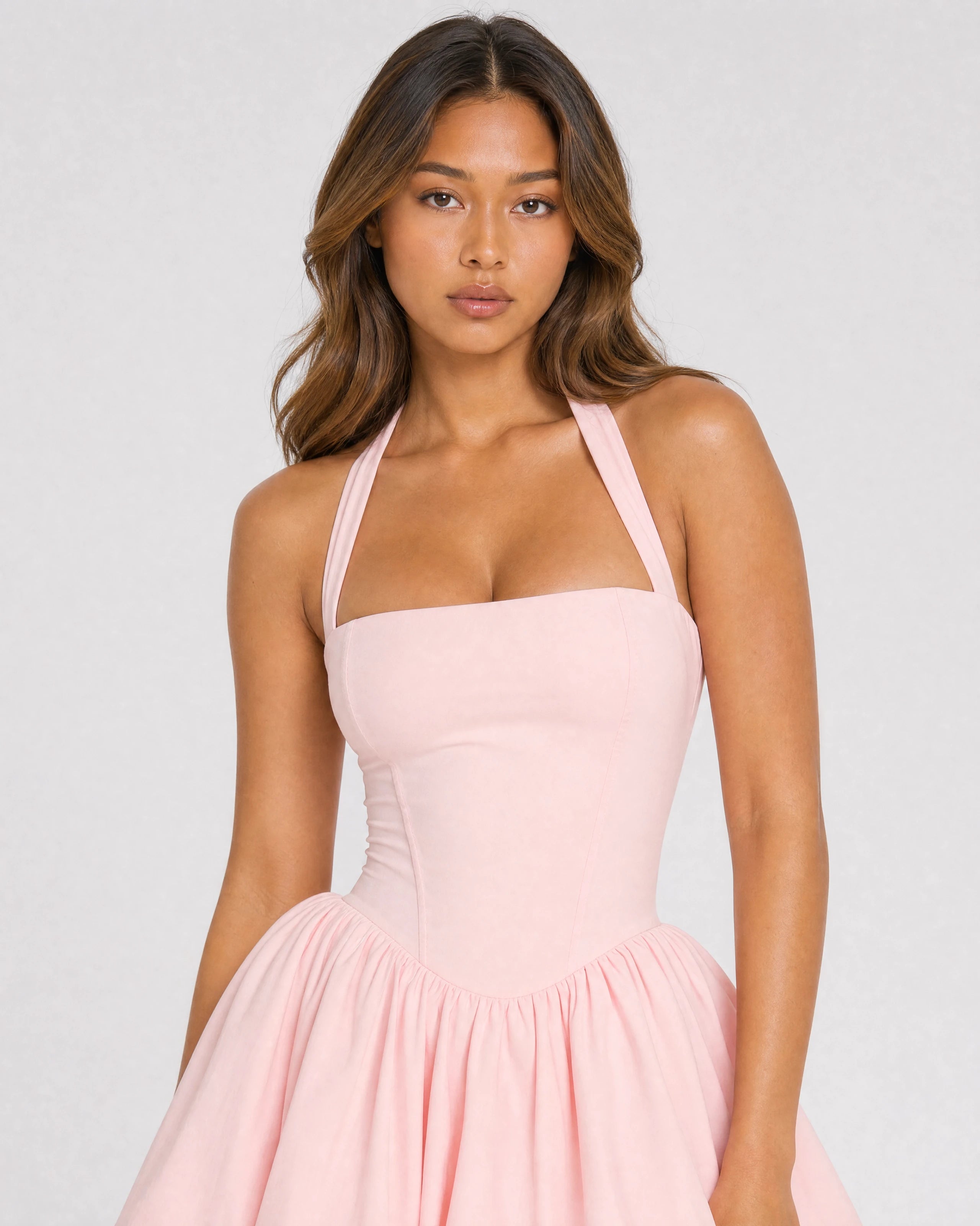 Bonnie blush halterneck mini dress with puffball skirt - waist-up close-up