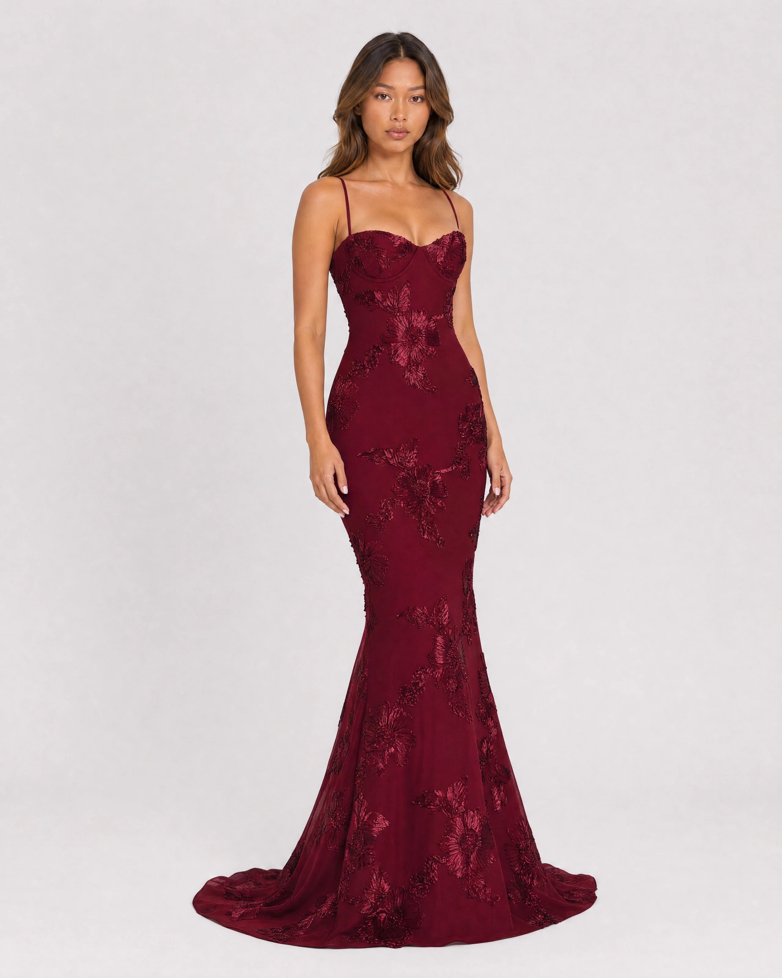 Flora embroidered floral mermaid gown in burgundy, three-quarter front