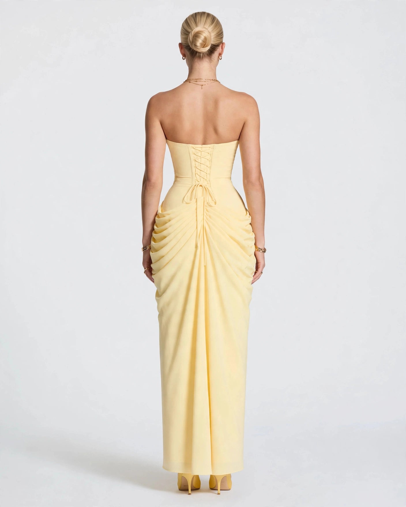 Seraphine butter yellow pleated corset maxi dress lace-up back, back view