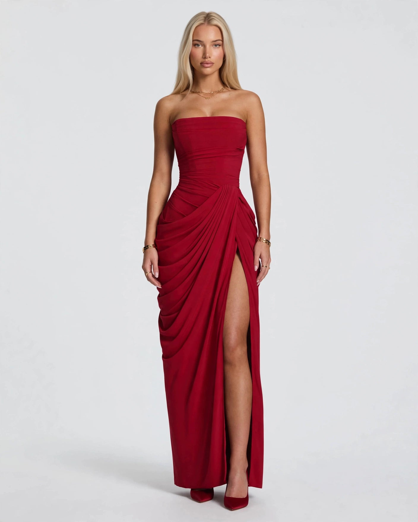 Seraphine wine red corset maxi gown with draped pleats and side split, front view