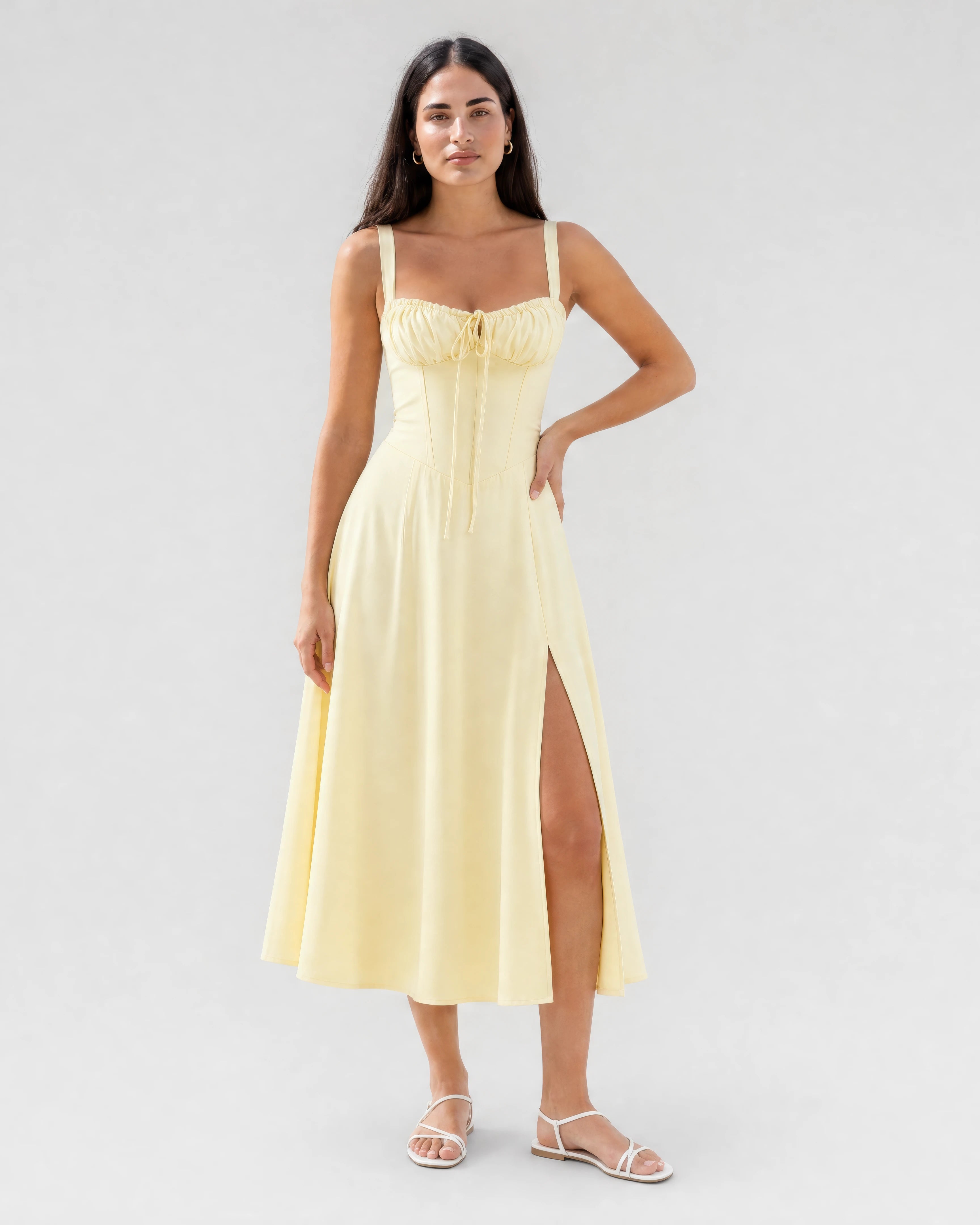 Soleil lace-up corset midi dress in butter yellow, studio