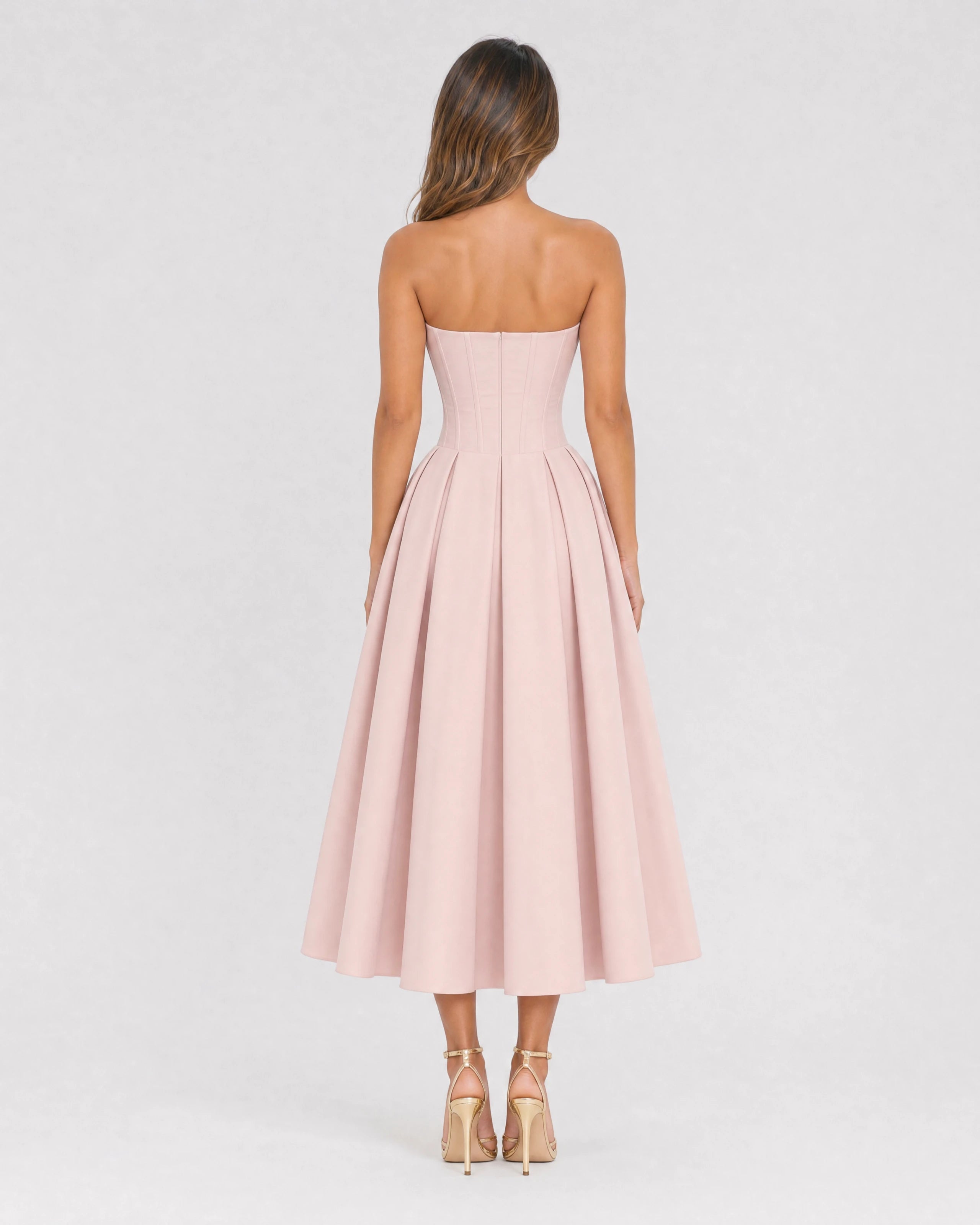 Adeline pink corset midi dress with full pleated skirt - back view
