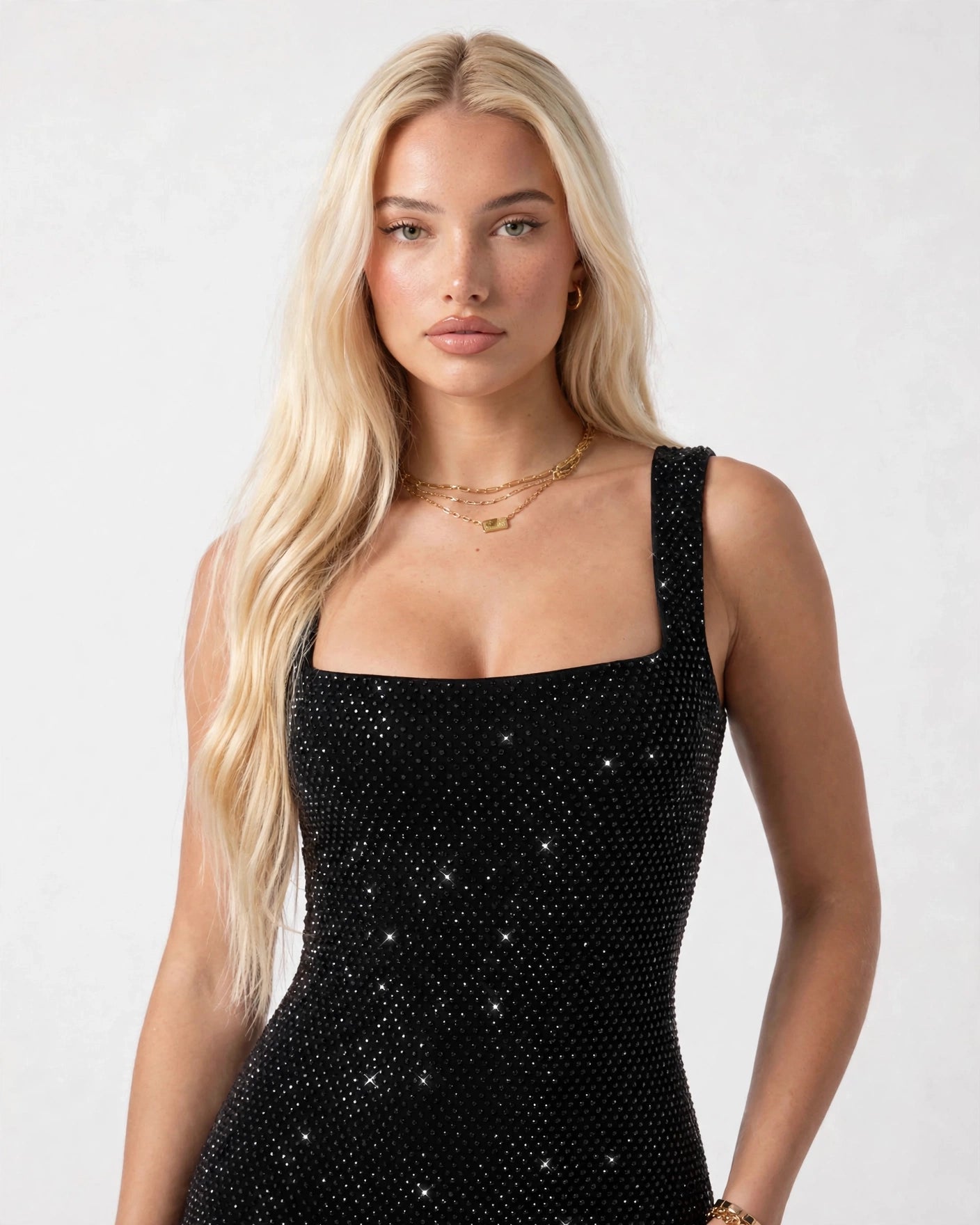 Aurelia black rhinestone sheer maxi gown - close-up of square neckline and crystal embellishment