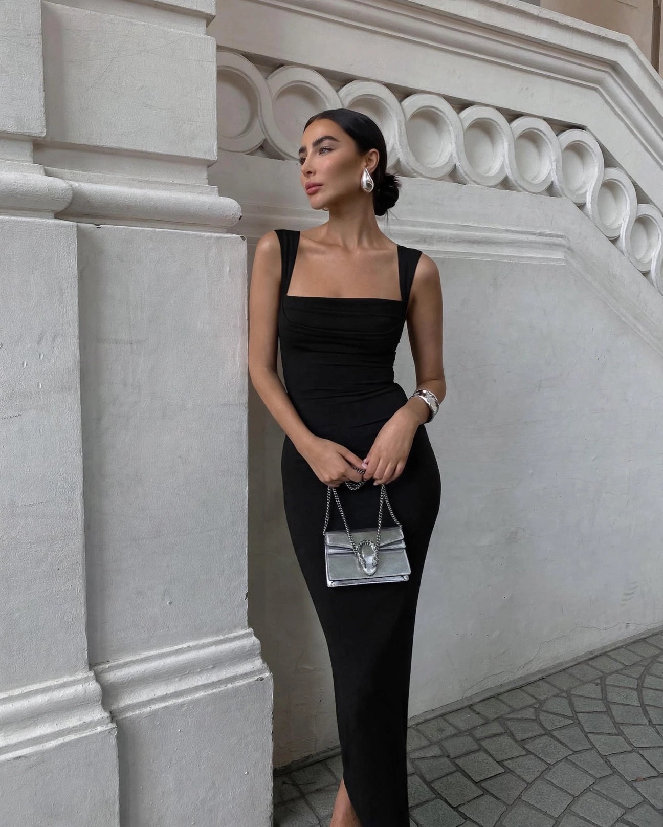 Celine black square neck maxi dress with pleated bust - front view, outdoor setting