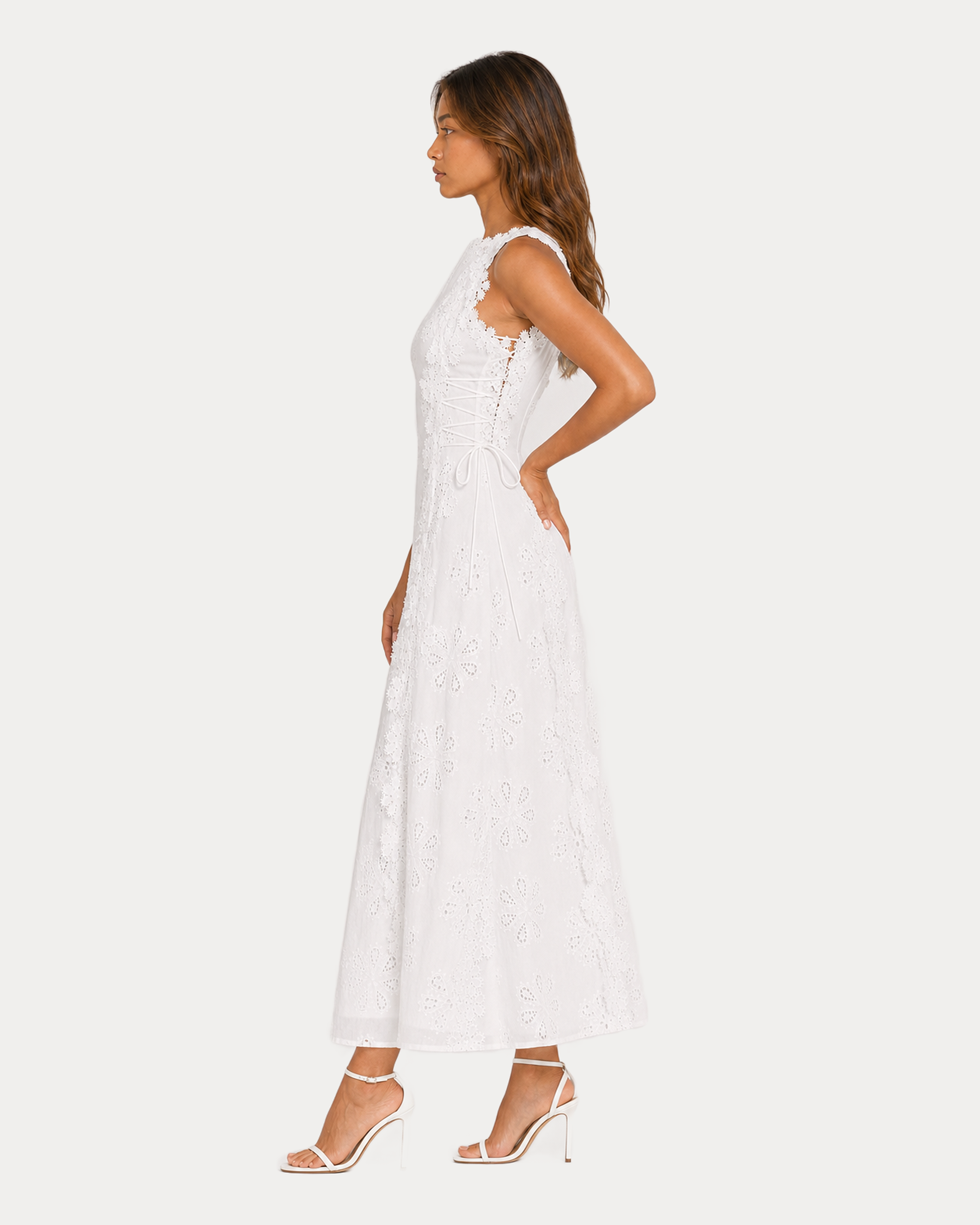 Side full-body view showing the adjustable lace-up waist ties