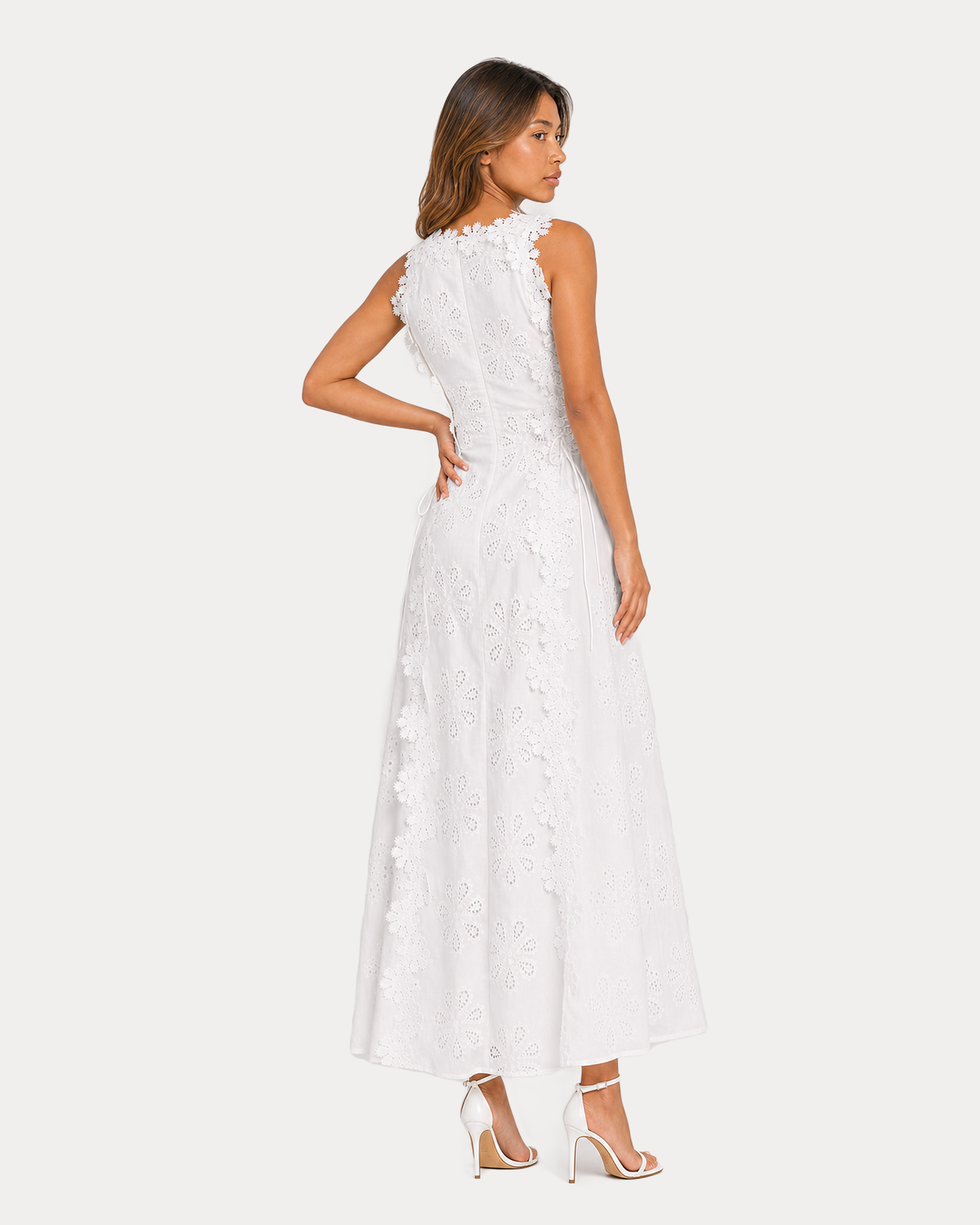 Back over-shoulder view of the white eyelet maxi dress