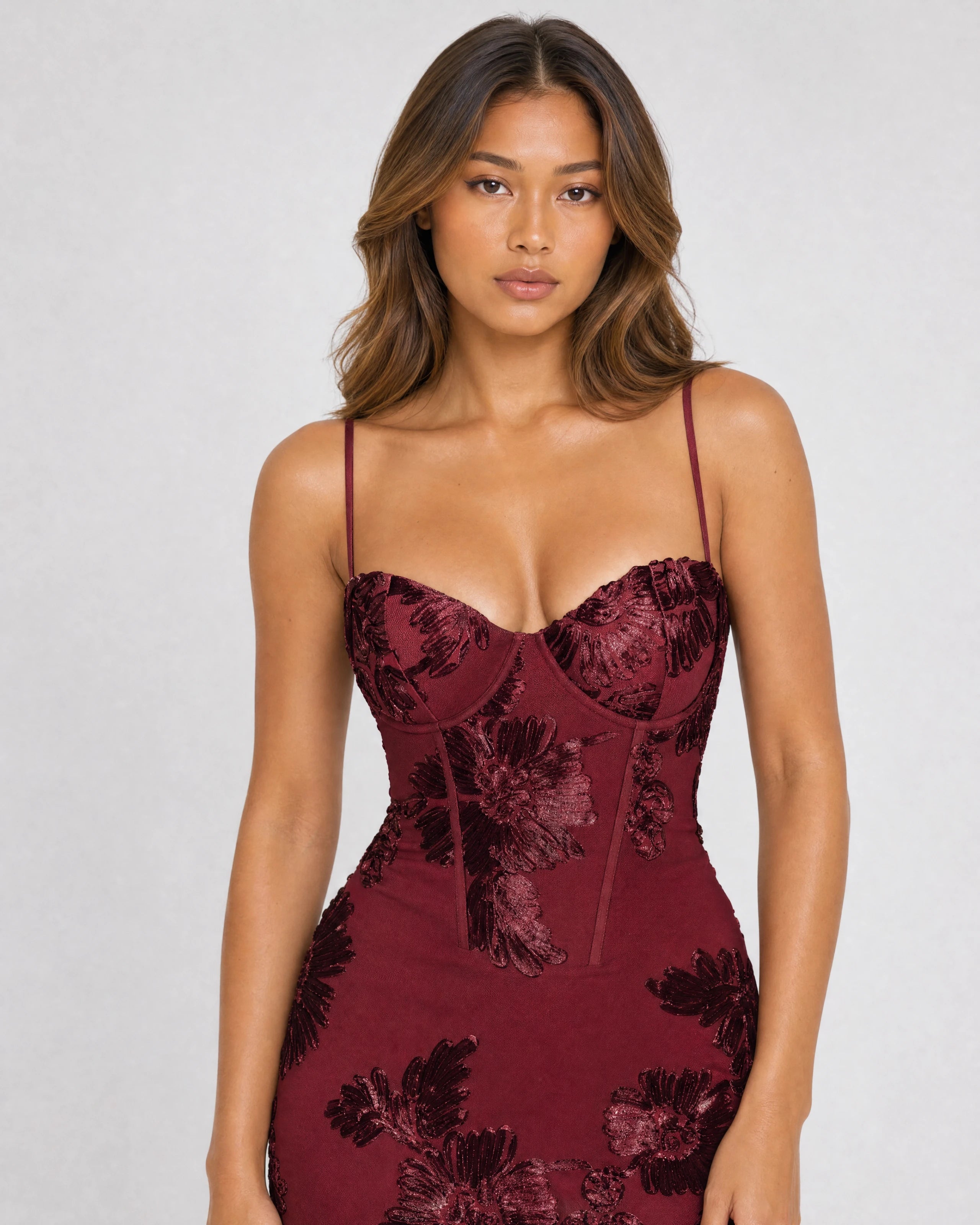 Flora embroidered floral mermaid gown in burgundy, bodice close-up