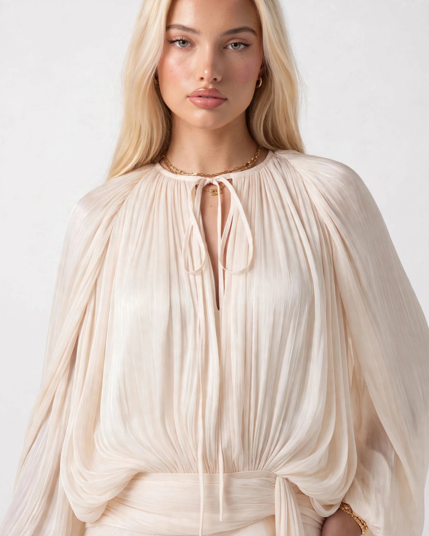 Juliette champagne pleated ruffle mini dress - close-up of tie neckline and gathered bodice