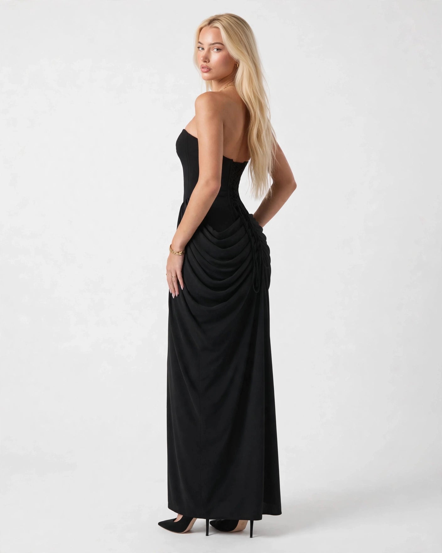 Seraphine black strapless corset column maxi gown, side view