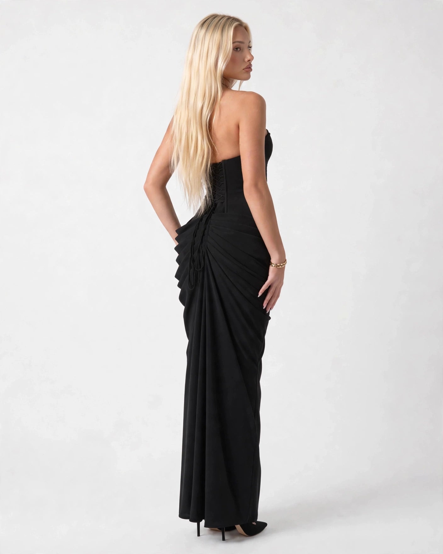 Seraphine black strapless corset column maxi gown, three-quarter back view