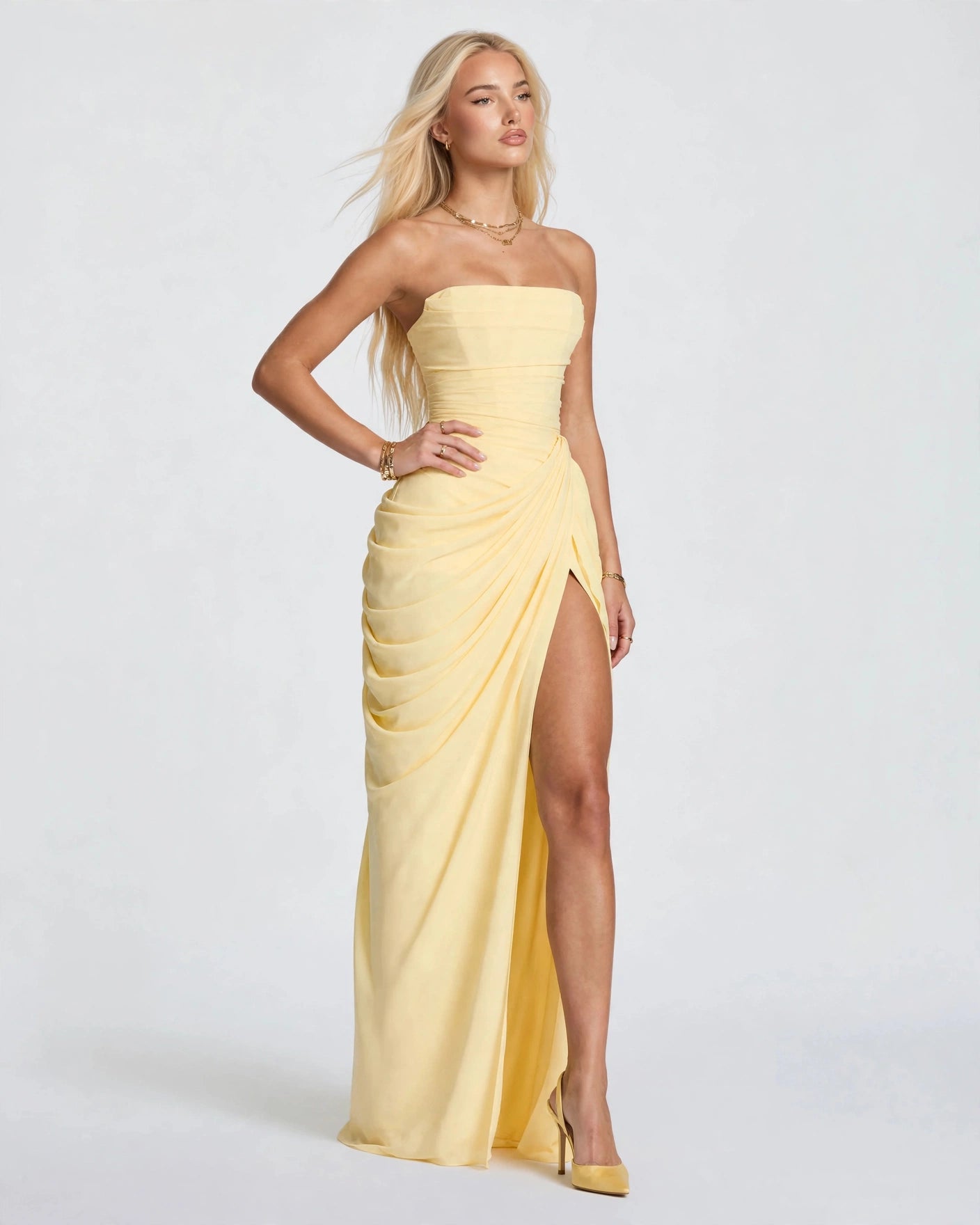 Seraphine butter yellow pleated corset maxi dress with thigh split, front view