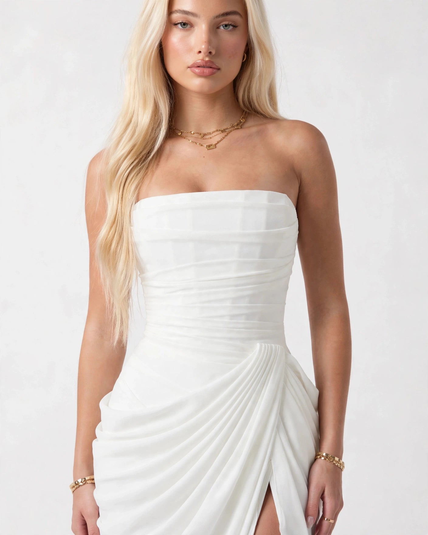 Seraphine white dress sculpted corset bodice and draped waist close-up