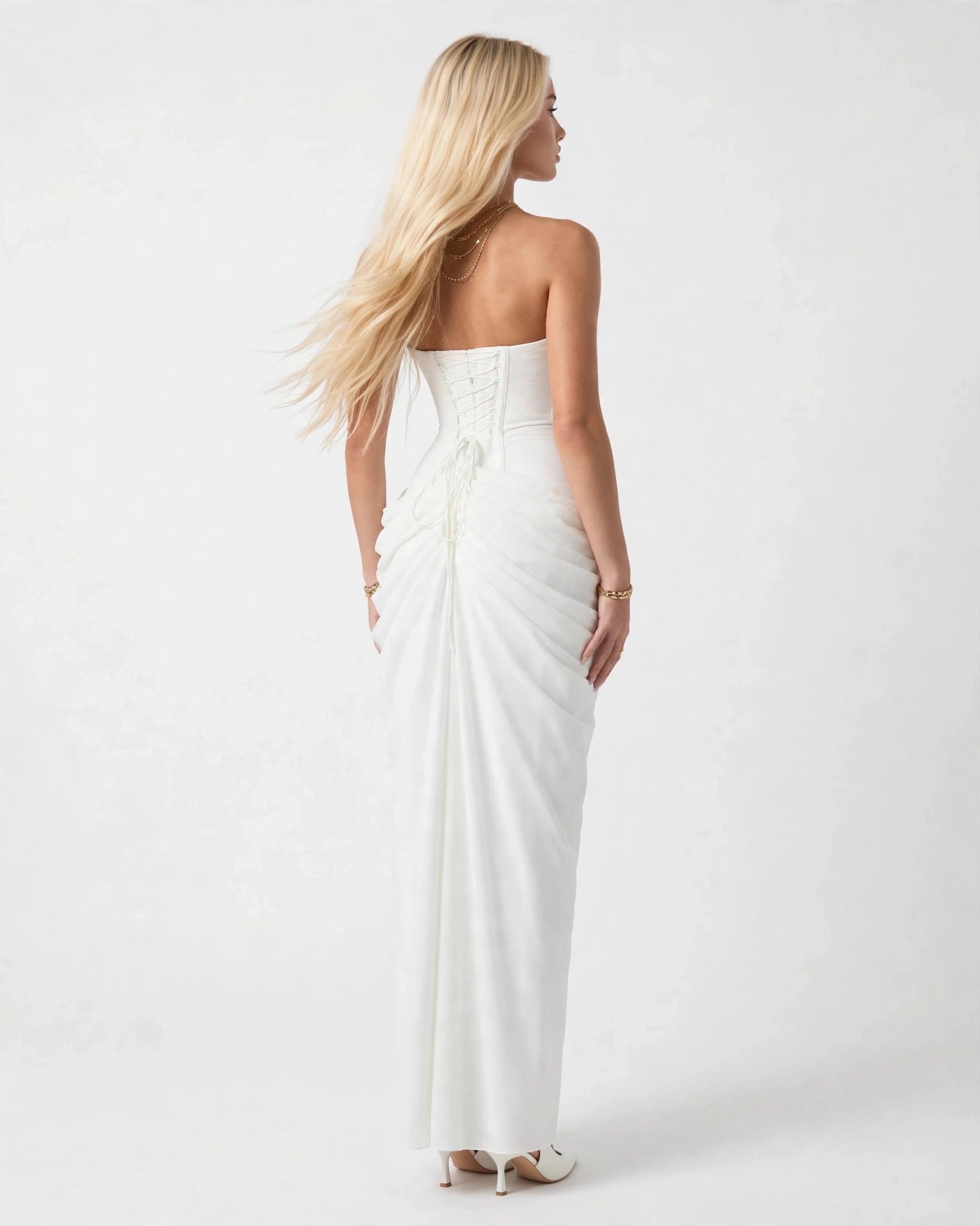 Seraphine white strapless pleated maxi dress, three-quarter back view